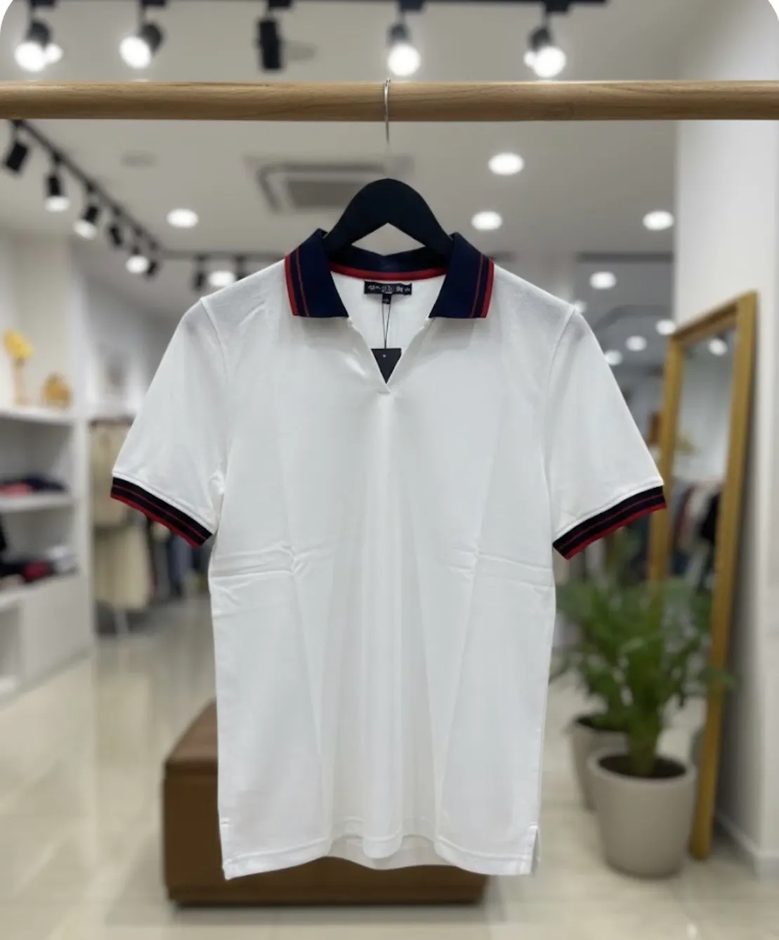 Women’s white polo